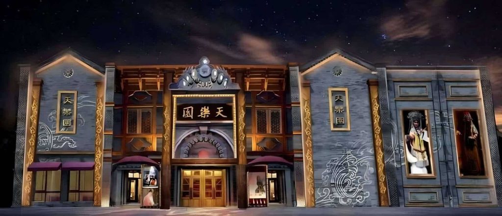Night view of Tianleyuan Grand Theater exterior in Beijing.